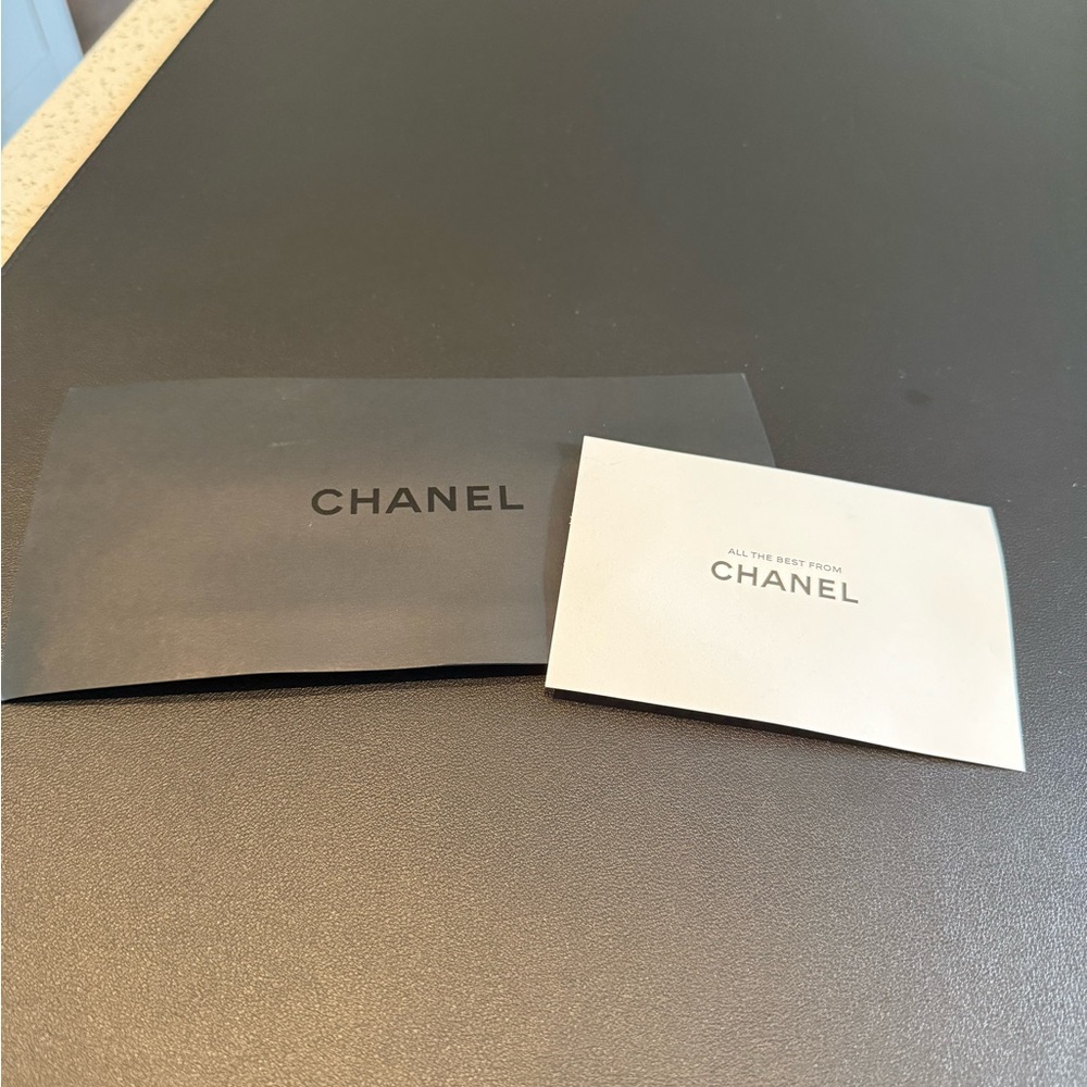 CHANEL Black envelope with white card